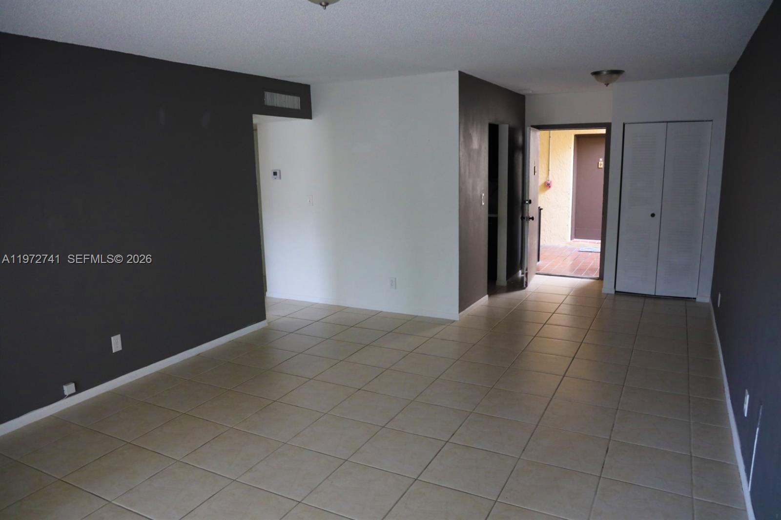 13714 Southwest 90th Avenue, Unit 25 Miami, FL 33176 - Photo 3 of 15 a view of a hallway