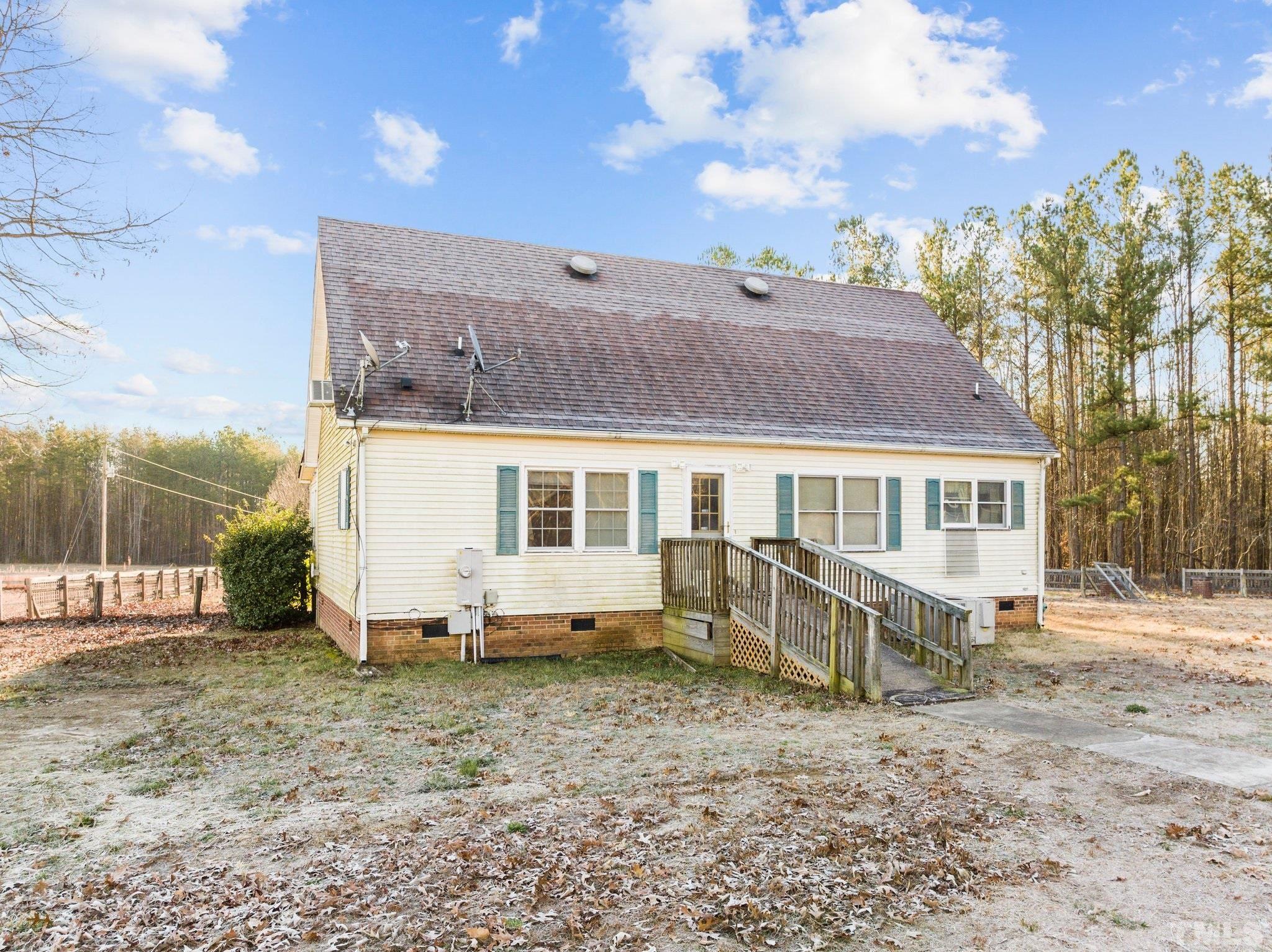 475 Moon Shine Ridge Roxboro, NC 27574 - Photo 13 of 37 a view of a house with a yard