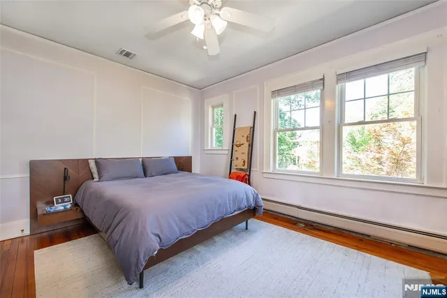 a bathroom with a toilet a sink and a shower