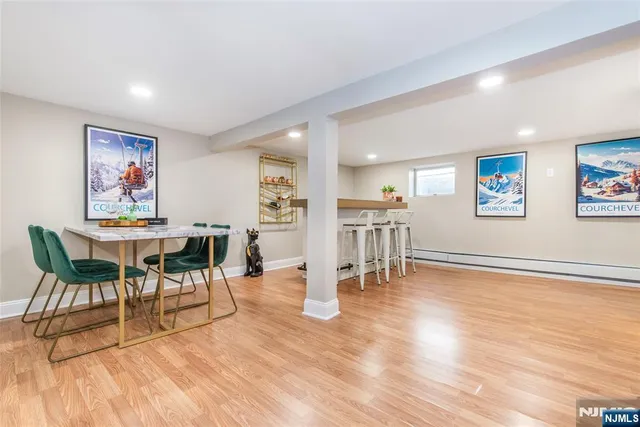 a view of deck with wooden floor and outdoor seating