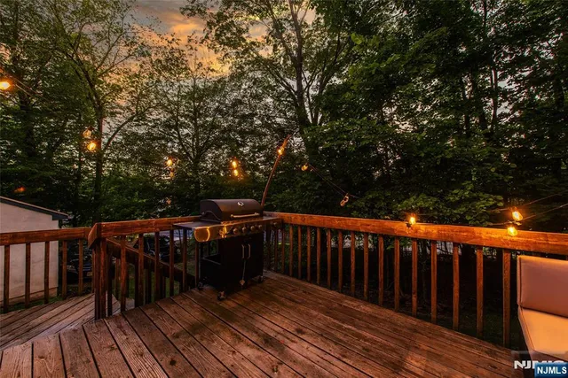 a bathroom with a toilet sink vanity and mirror