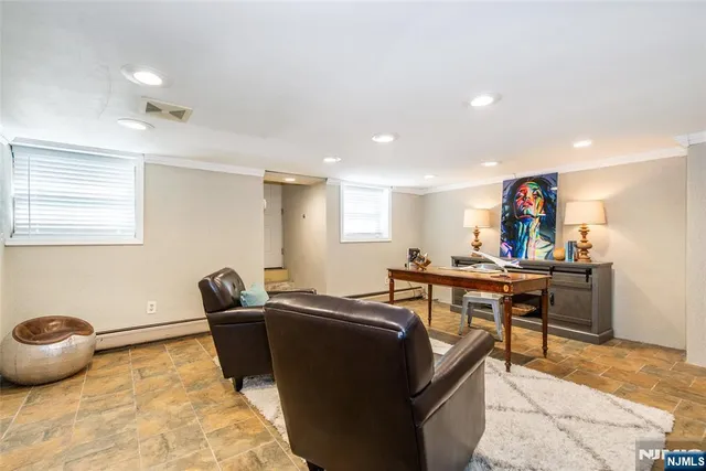 a view of balcony with wooden floor and outdoor seating