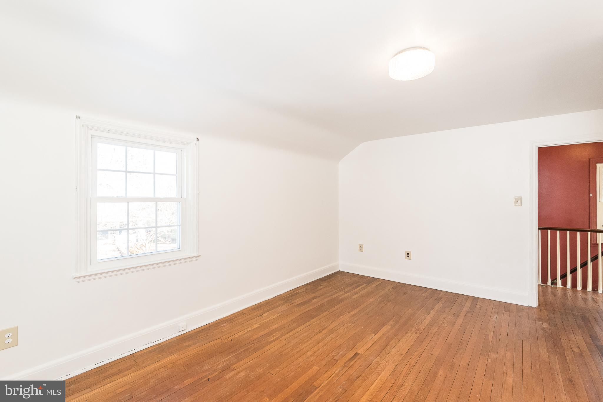 605 Cedarcroft Road Baltimore, MD 21212 - Photo 9 of 63 Primary bedroom upper level nice wood floors