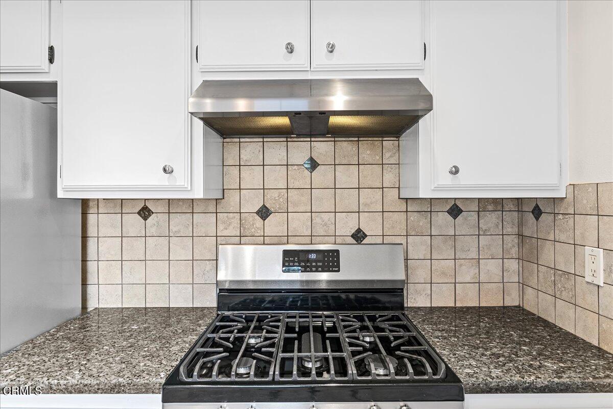 1143 Highland Avenue Duarte, CA 91010 - Photo 11 of 33 a stove top oven sitting inside of a kitchen