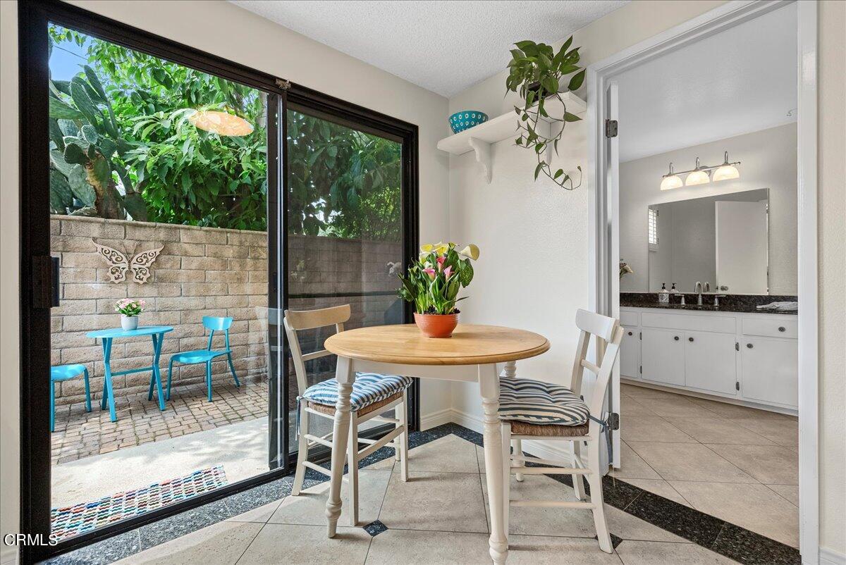1143 Highland Avenue Duarte, CA 91010 - Photo 14 of 33 a view of a dining room with furniture window and wooden floor