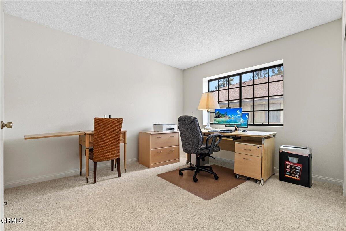 1143 Highland Avenue Duarte, CA 91010 - Photo 17 of 33 a view of a workspace with furniture and a window