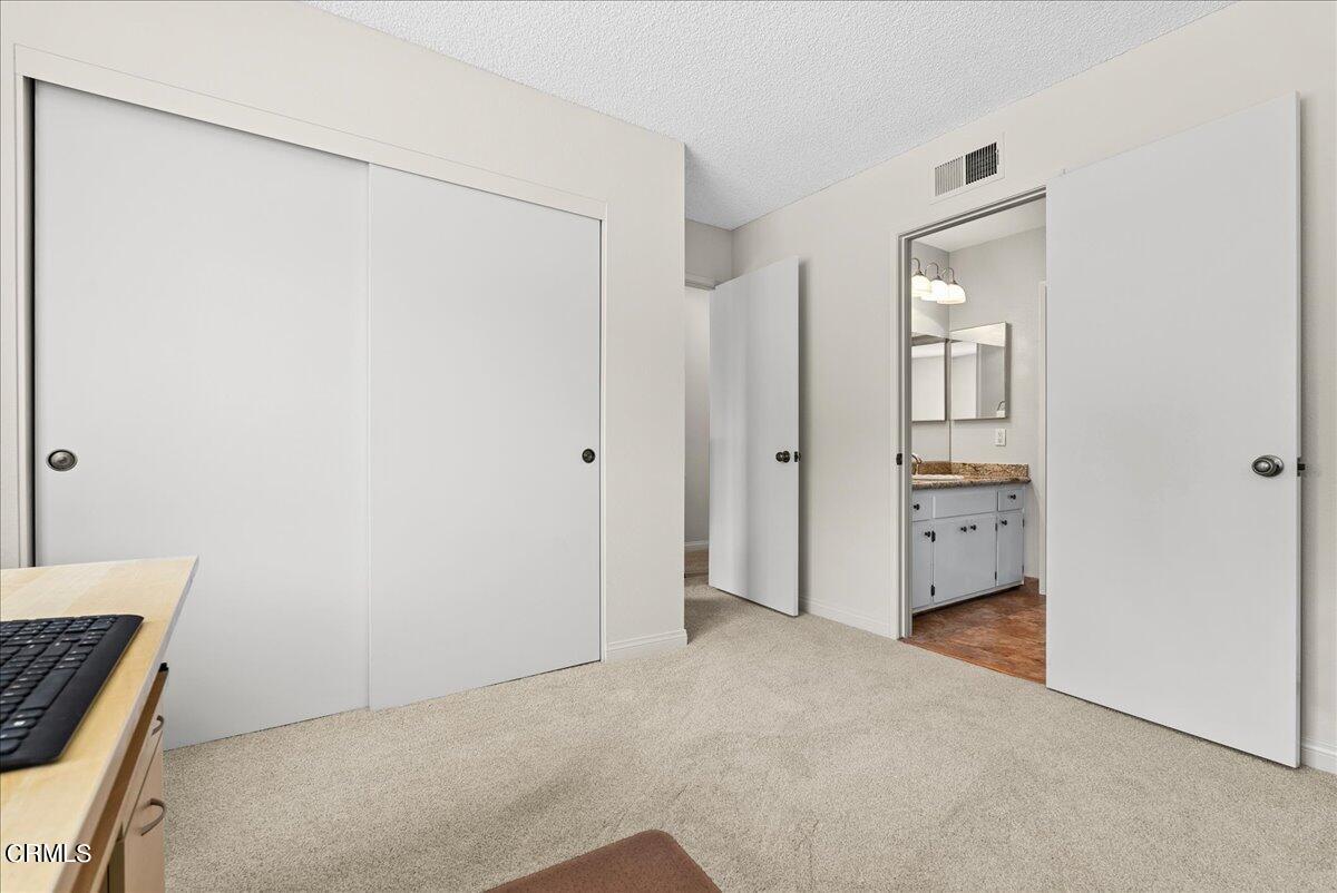 1143 Highland Avenue Duarte, CA 91010 - Photo 18 of 33 a view of a room with a wardrobe space