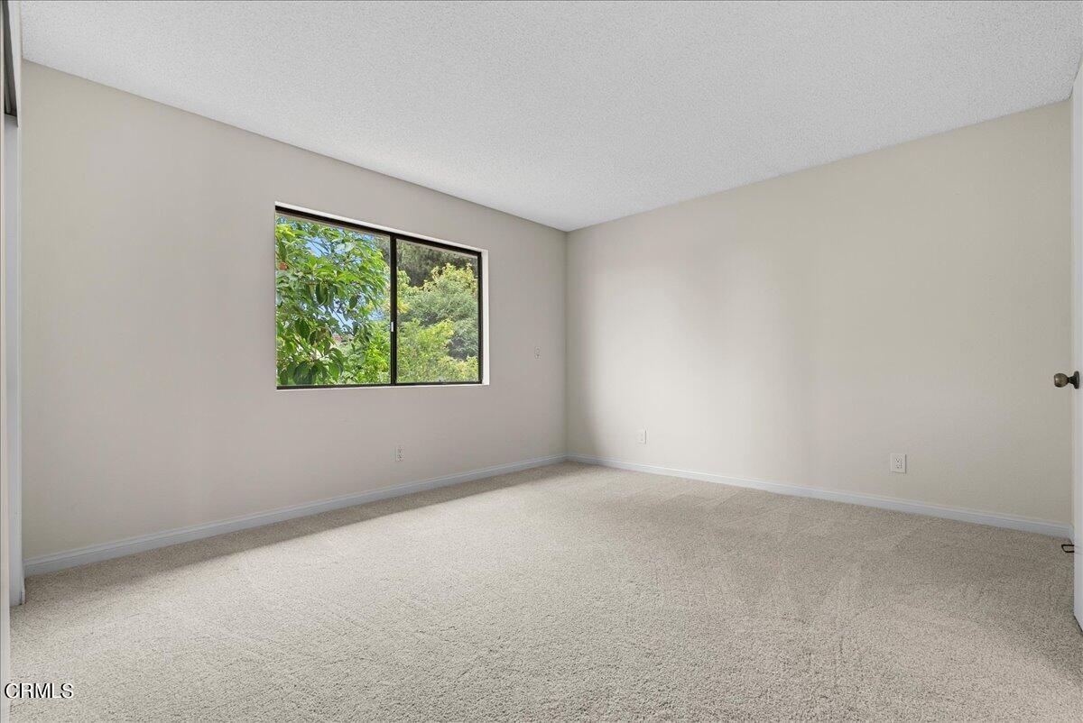 1143 Highland Avenue Duarte, CA 91010 - Photo 21 of 33 an empty room with windows