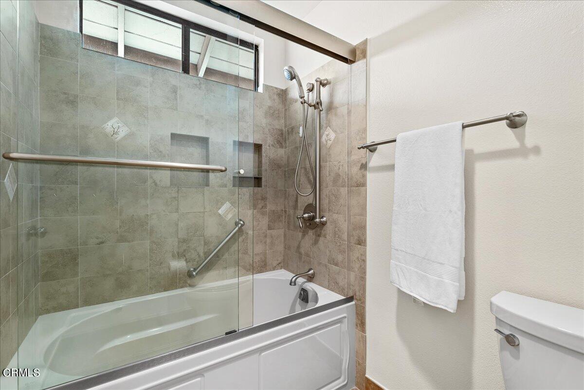 1143 Highland Avenue Duarte, CA 91010 - Photo 26 of 33 a bathroom with a bathtub and a shower