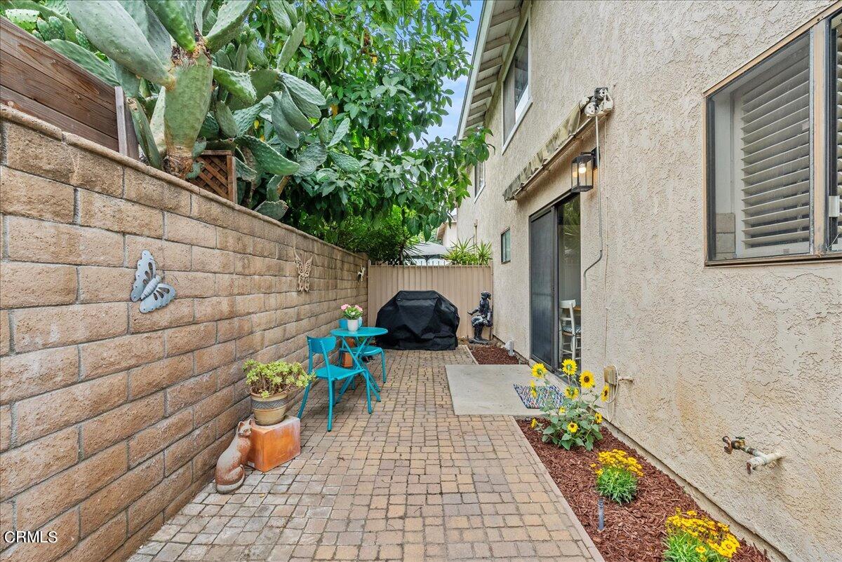 1143 Highland Avenue Duarte, CA 91010 - Photo 28 of 33 a path view of a house with chairs and potted plants