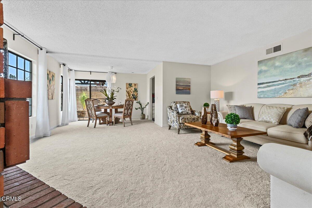 1143 Highland Avenue Duarte, CA 91010 - Photo 4 of 33 a view of a livingroom with furniture and a flat screen tv