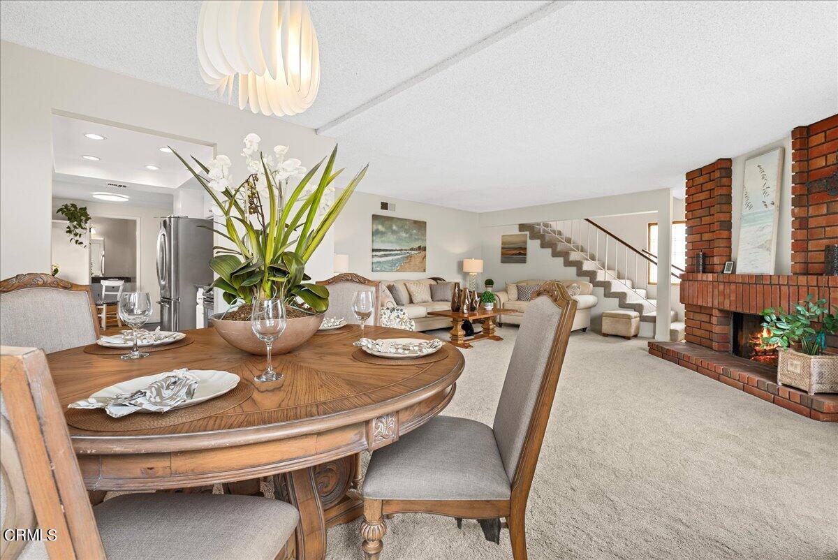 1143 Highland Avenue Duarte, CA 91010 - Photo 9 of 33 a view of a dining room with furniture and a chandelier