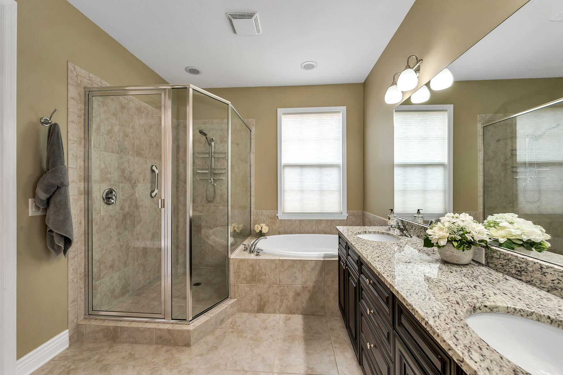 9066 Albion Lane North, Unit 5101 Naples, FL 34113 - Photo 21 of 48 a spacious bathroom with a granite countertop tub shower and window