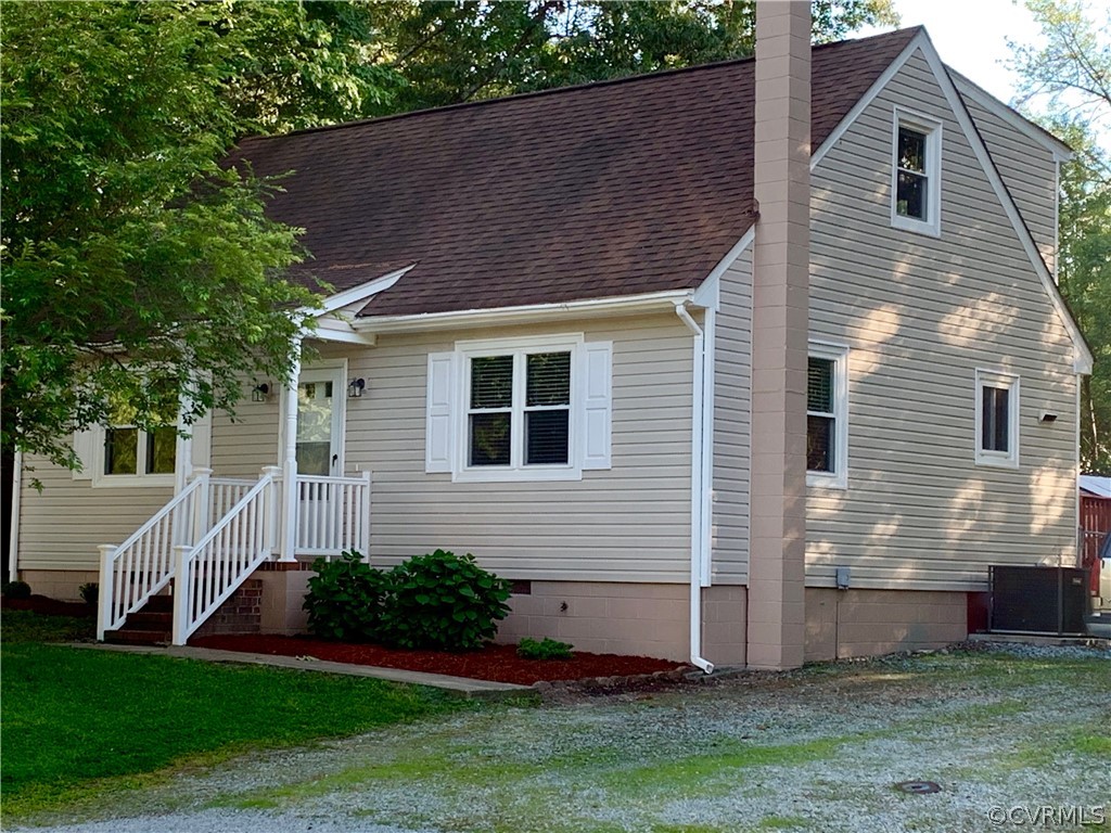 14104 South Hackberry Road Chester, VA 23836 - Photo 2 of 27 a front view of house with yard
