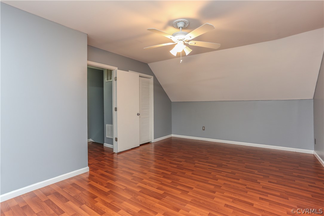 14104 South Hackberry Road Chester, VA 23836 - Photo 8 of 27 a view of an empty room with wooden floor
