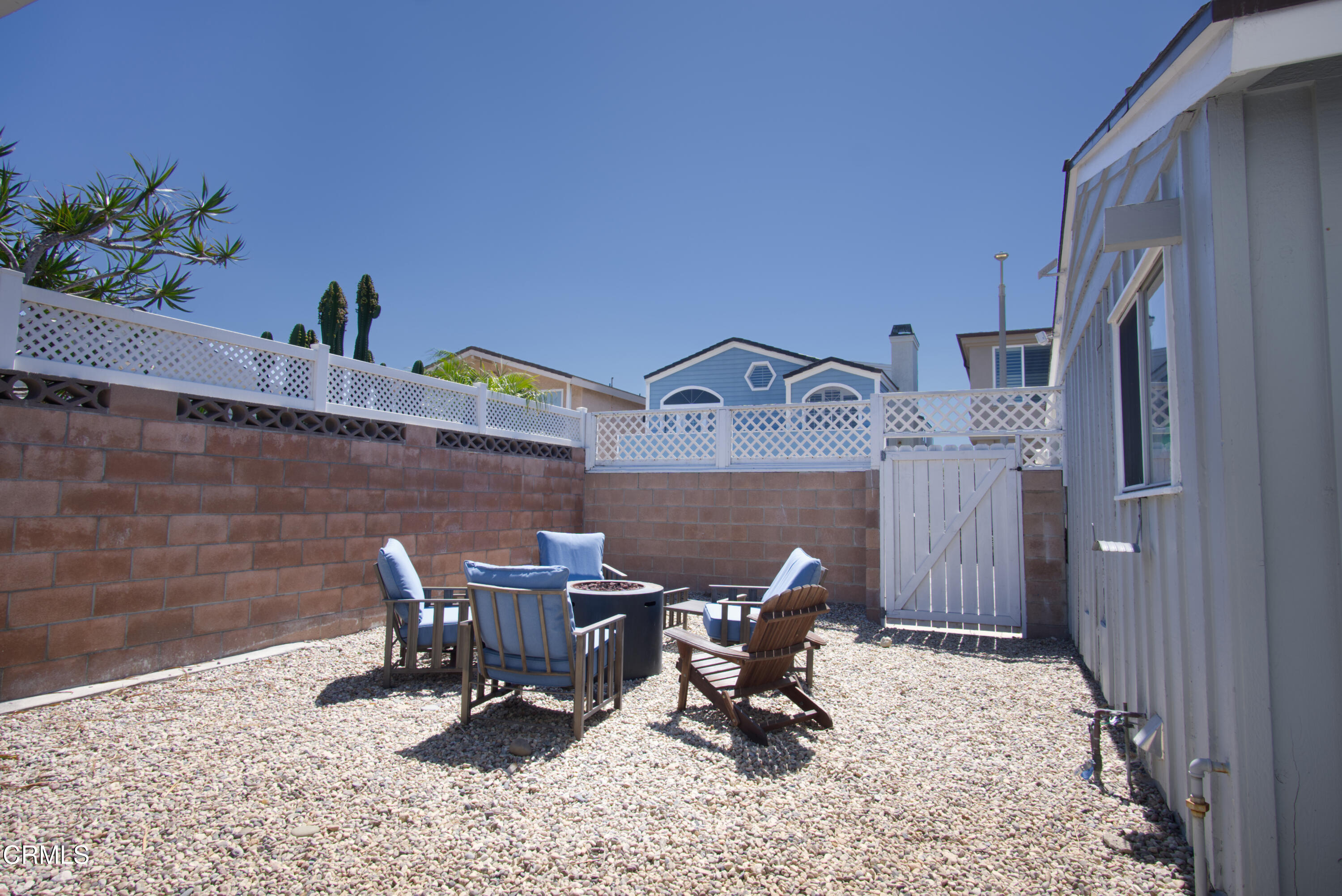 5230 Beachcomber Street Oxnard, CA 93035 - Photo 11 of 13 a view of a dinning room with a table and chairs
