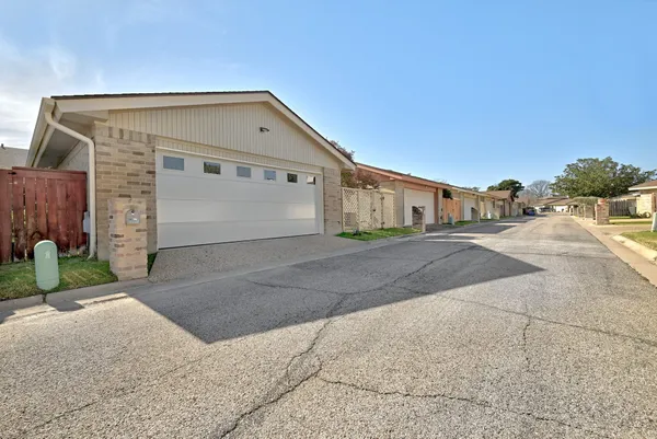 a view of swimming pool with seating space