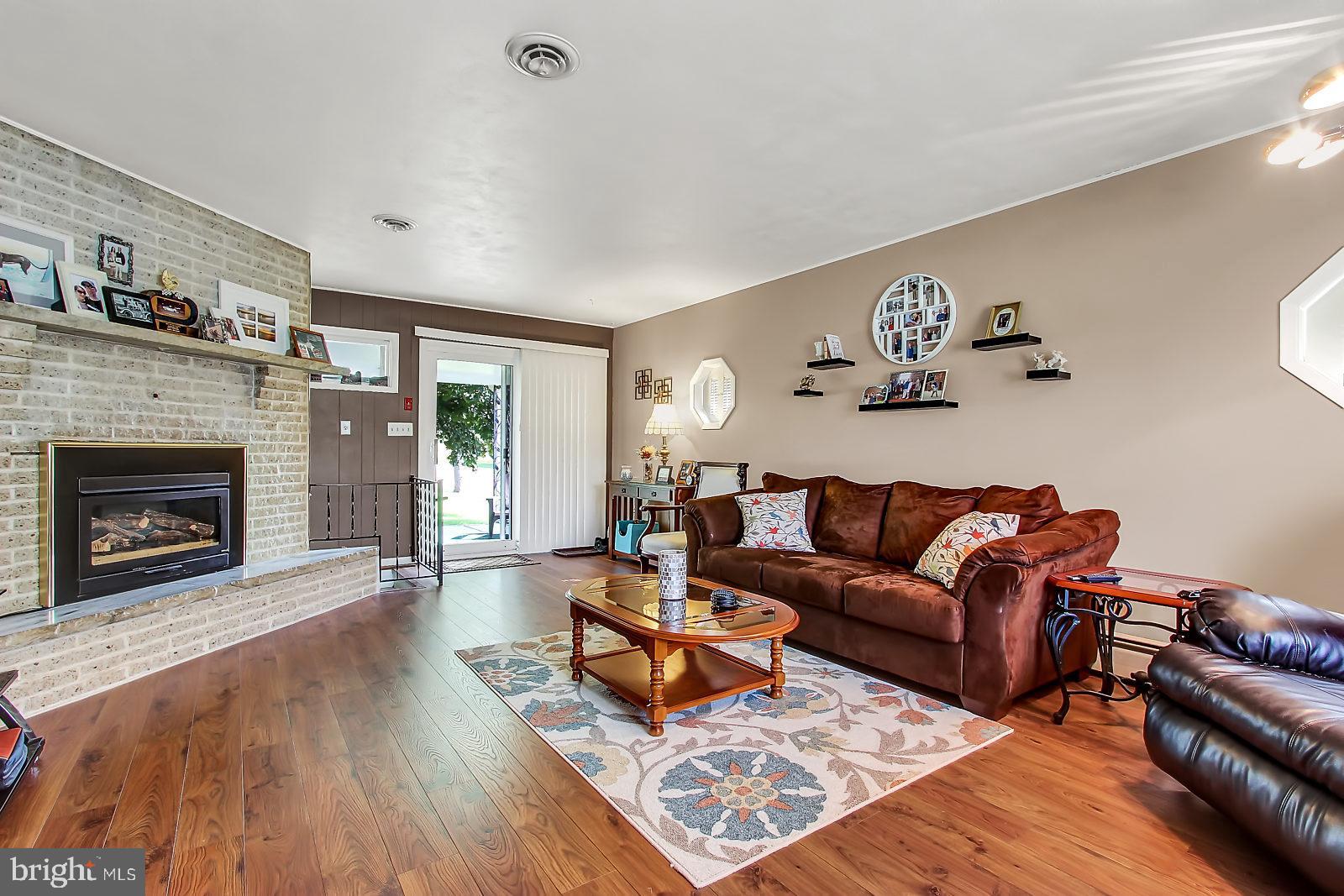 107 Bollinger Road Littlestown, PA 17340 - Photo 14 of 27 a living room with furniture and a fireplace