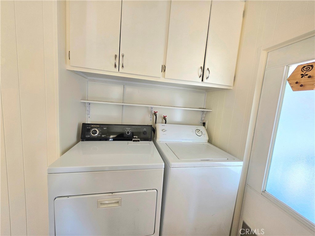 6271 East Sea Breeze Drive, Unit 36 Long Beach, CA 90803 - Photo 14 of 34 a view of storage and utility room with washer and dryer