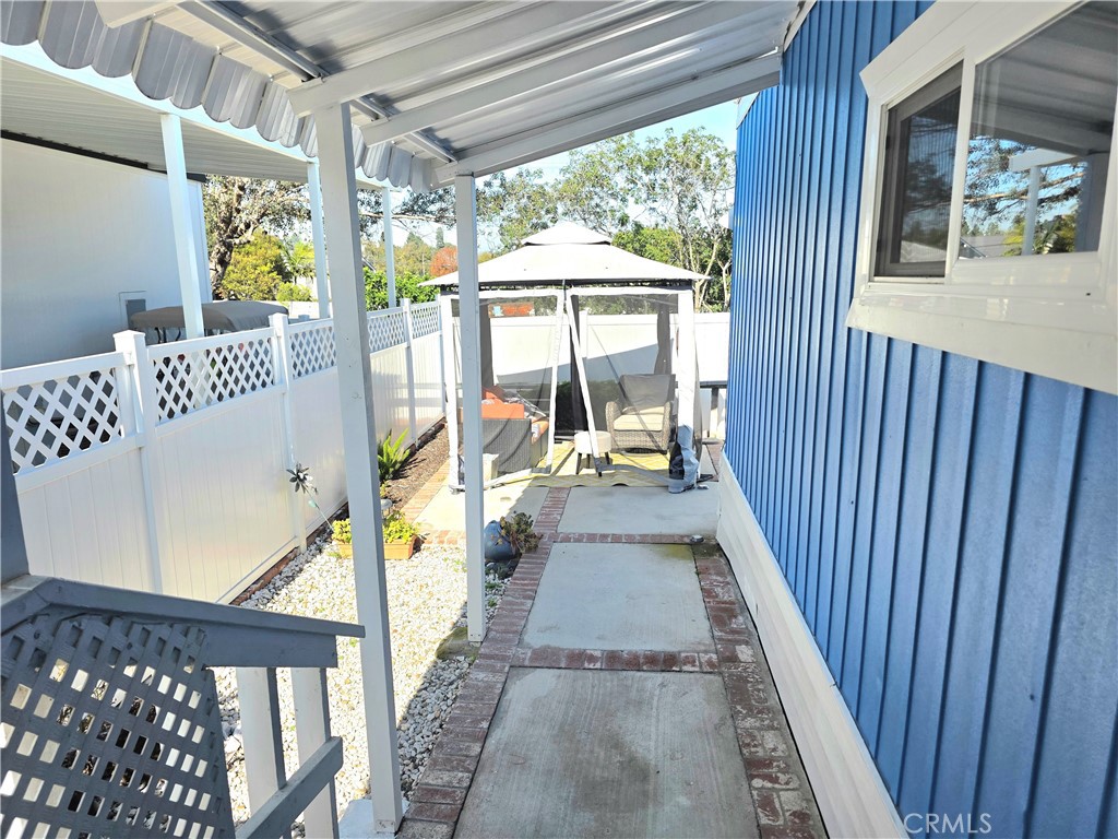 6271 East Sea Breeze Drive, Unit 36 Long Beach, CA 90803 - Photo 17 of 34 a view of balcony with wooden floor