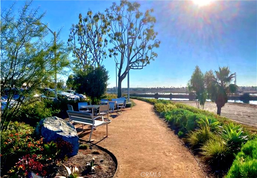 6271 East Sea Breeze Drive, Unit 36 Long Beach, CA 90803 - Photo 23 of 34 a view of a backyard with sitting area