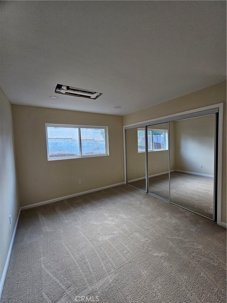 2641 Valley View Avenue Norco, CA 92860 - Photo 11 of 24 a view of an empty room with a window