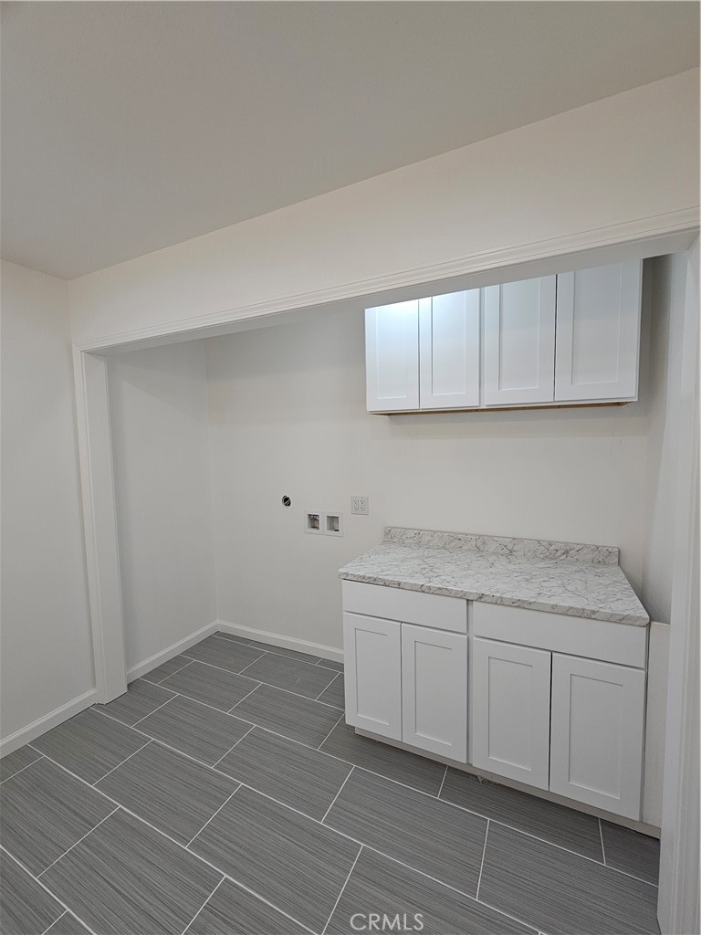 2641 Valley View Avenue Norco, CA 92860 - Photo 15 of 24 a room with a sink cabinets and utility room