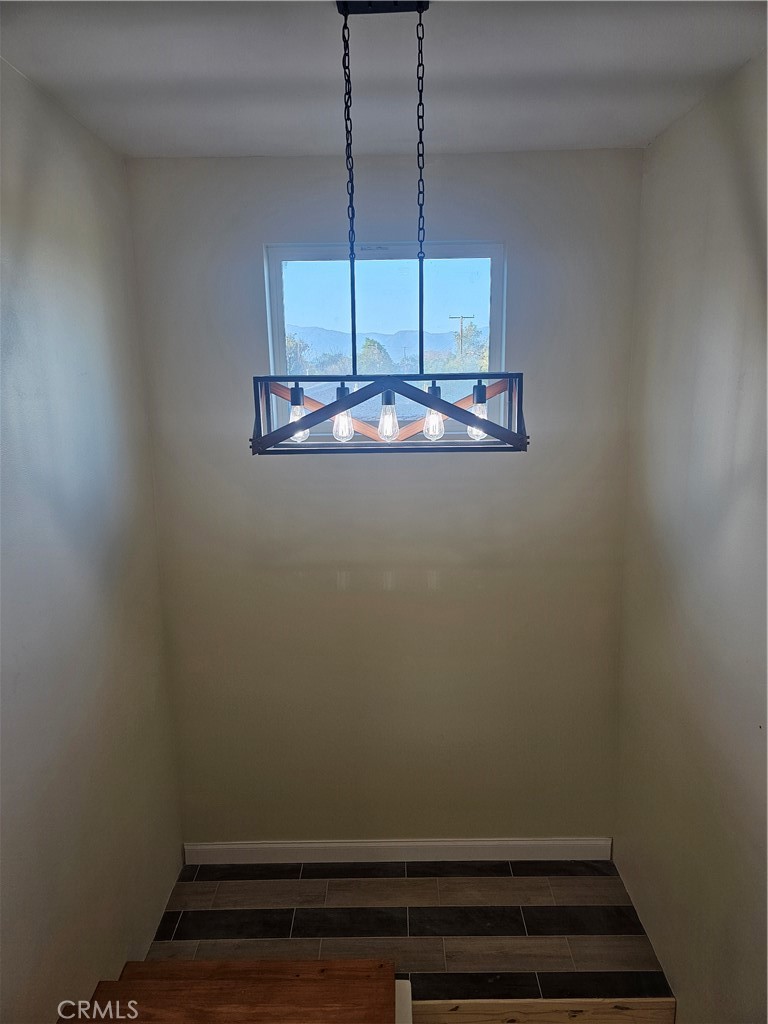 2641 Valley View Avenue Norco, CA 92860 - Photo 18 of 24 a view of room with a ceiling fan and window