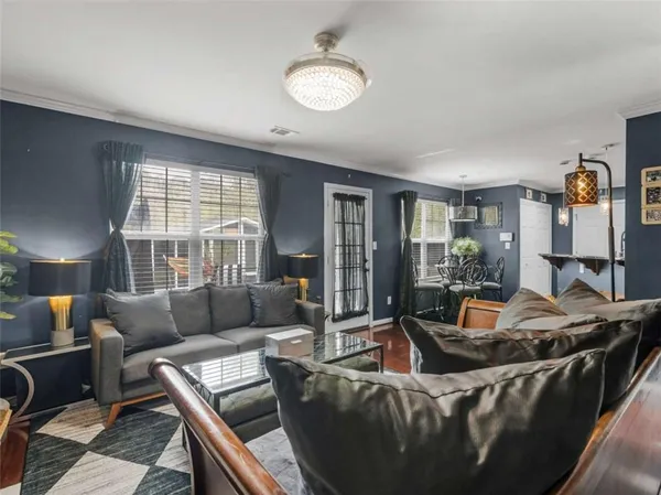 a bedroom with a bed and ceiling fan