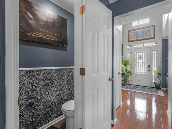 a bathroom with 2 sink and a mirror
