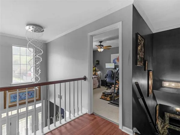 a bedroom with a bed furniture and a window