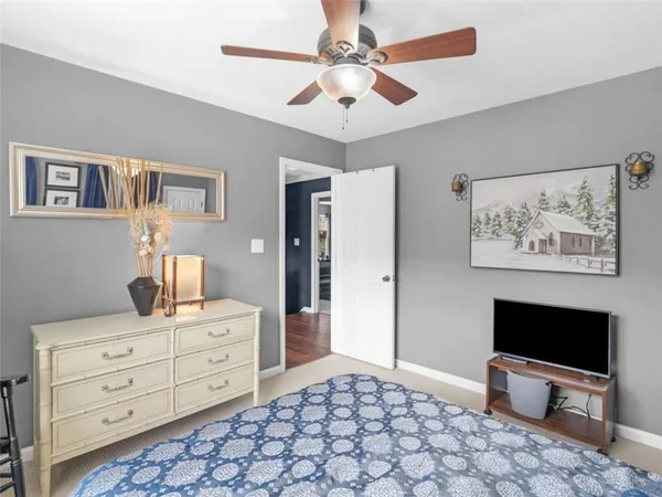 a kitchen with stainless steel appliances granite countertop a refrigerator and a stove