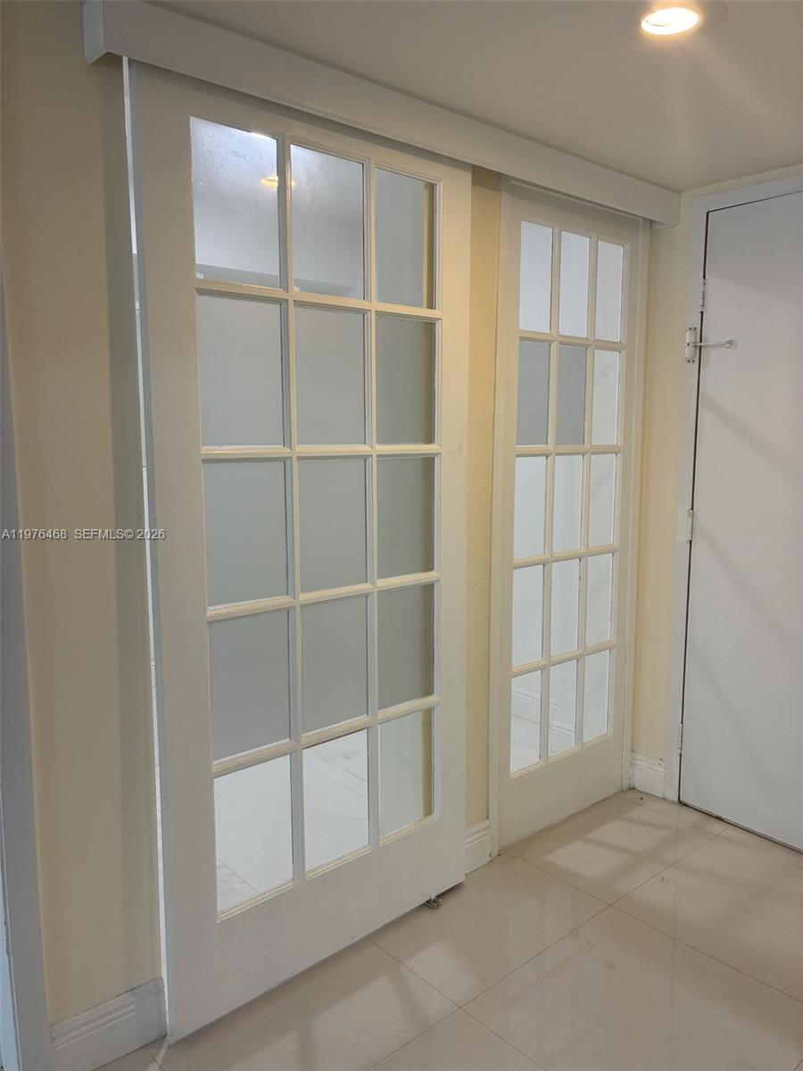 16500 Golf Club Road, Unit 205 Weston, FL 33326 - Photo 18 of 18 a view of an empty room with a window