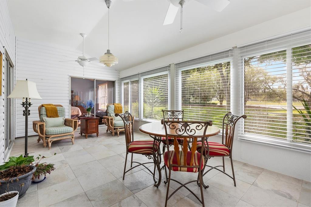 711 Agua Way Lady Lake, FL 32159 - Photo 15 of 16 a view of a livingroom with furniture window and outside view