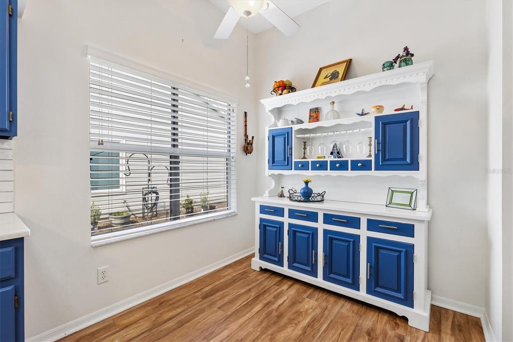 711 Agua Way Lady Lake, FL 32159 - Photo 7 of 16 a view of an empty room with a window