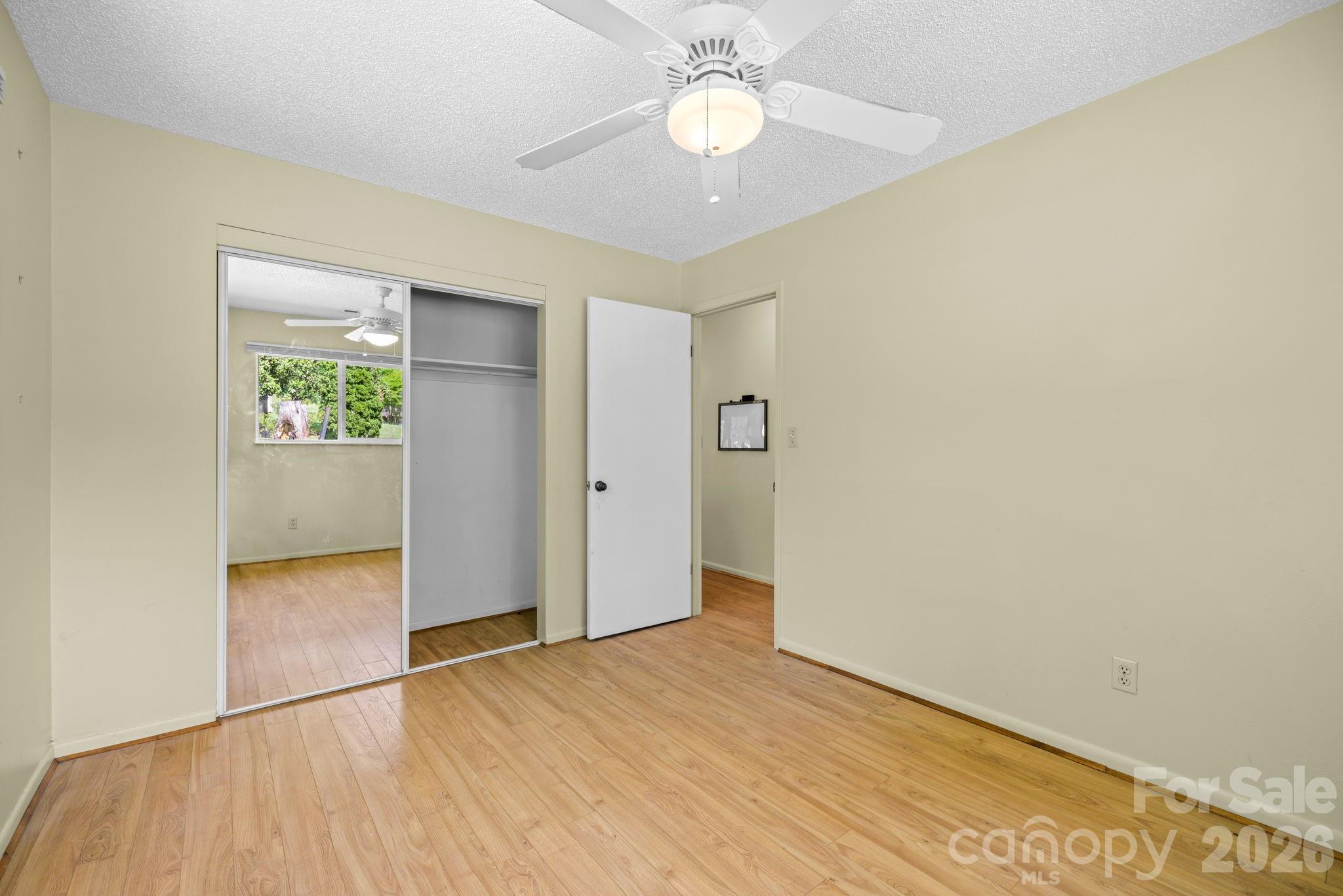 19 Quail Ridge Trail Franklin, NC 28734 - Photo 16 of 37 wooden floor in an empty room