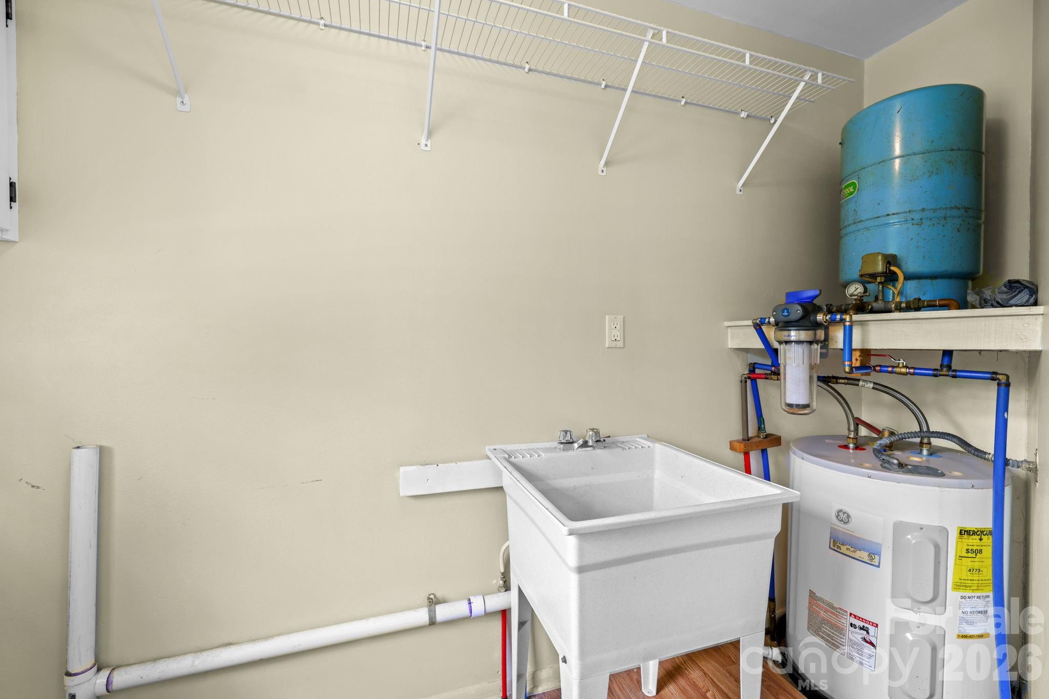 19 Quail Ridge Trail Franklin, NC 28734 - Photo 22 of 37 a view of storage and utility room with two washing machine