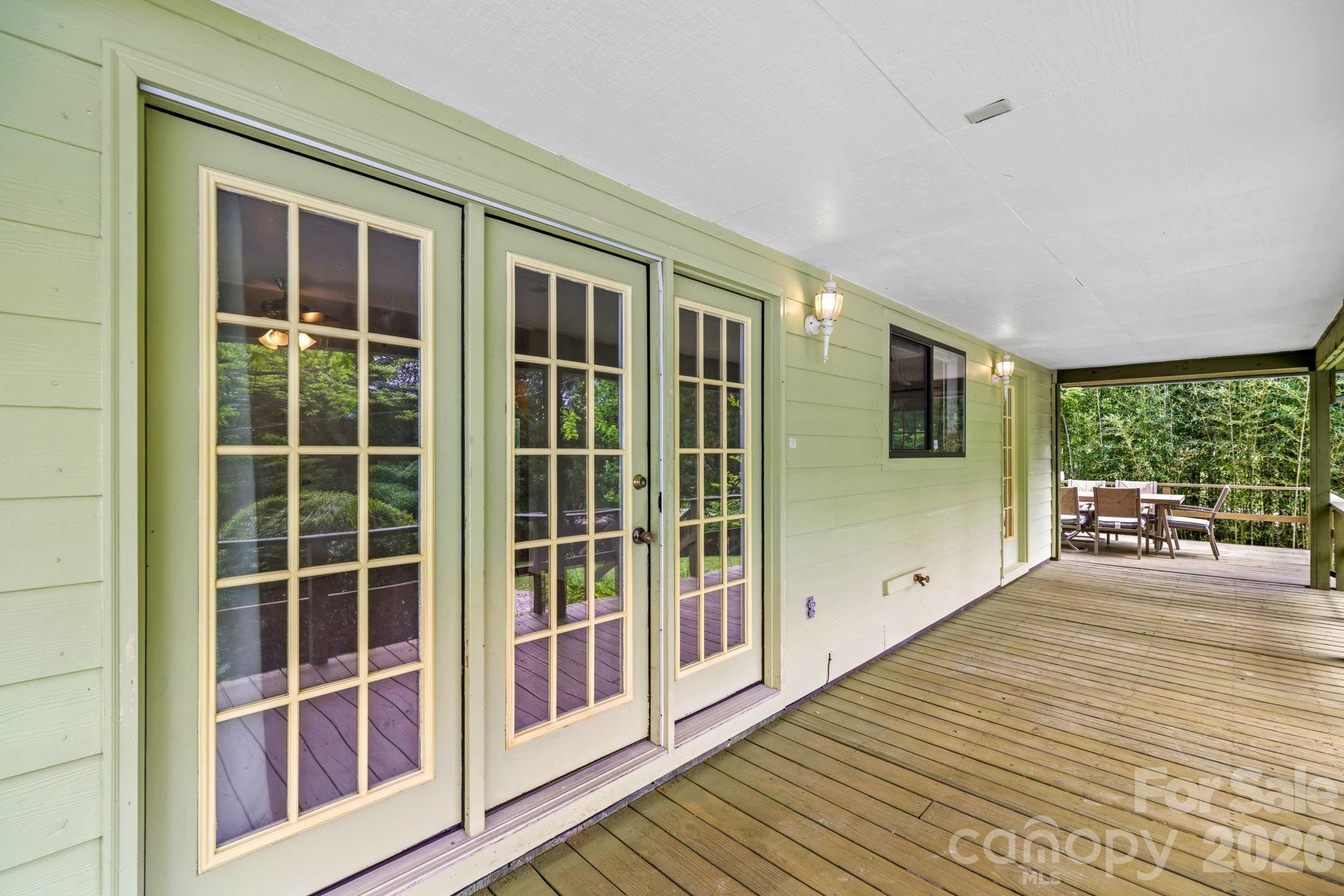 19 Quail Ridge Trail Franklin, NC 28734 - Photo 23 of 37 a view of a balcony with wooden floor
