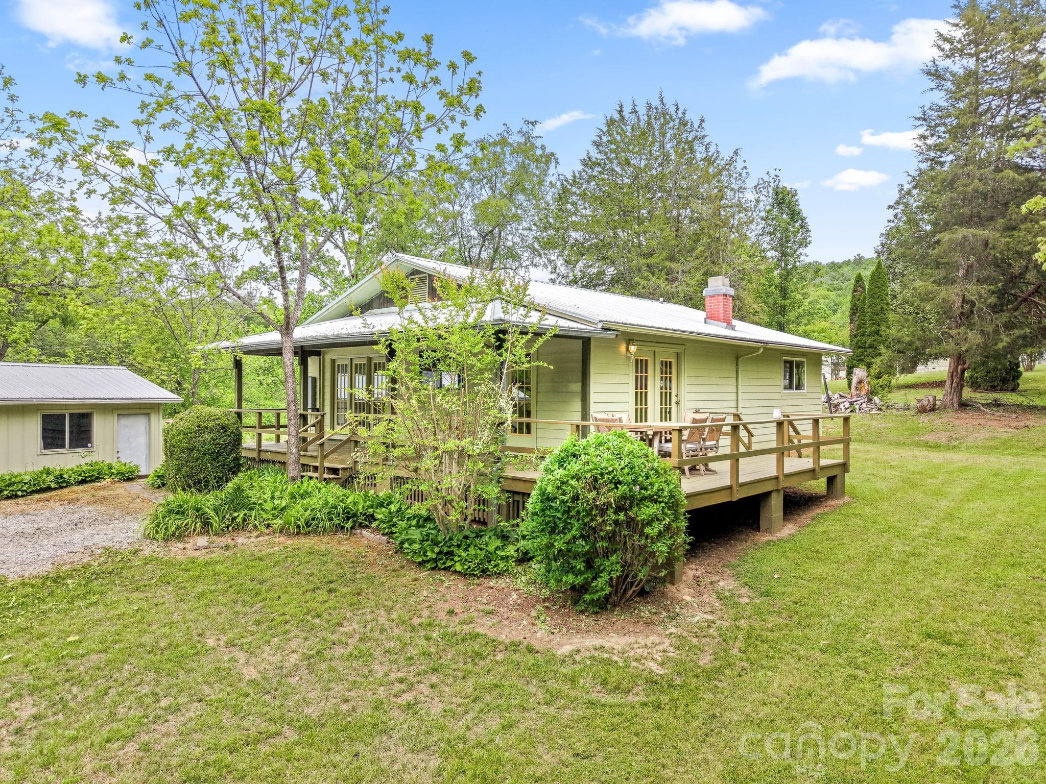 19 Quail Ridge Trail Franklin, NC 28734 - Photo 27 of 37 a view of a house with a yard
