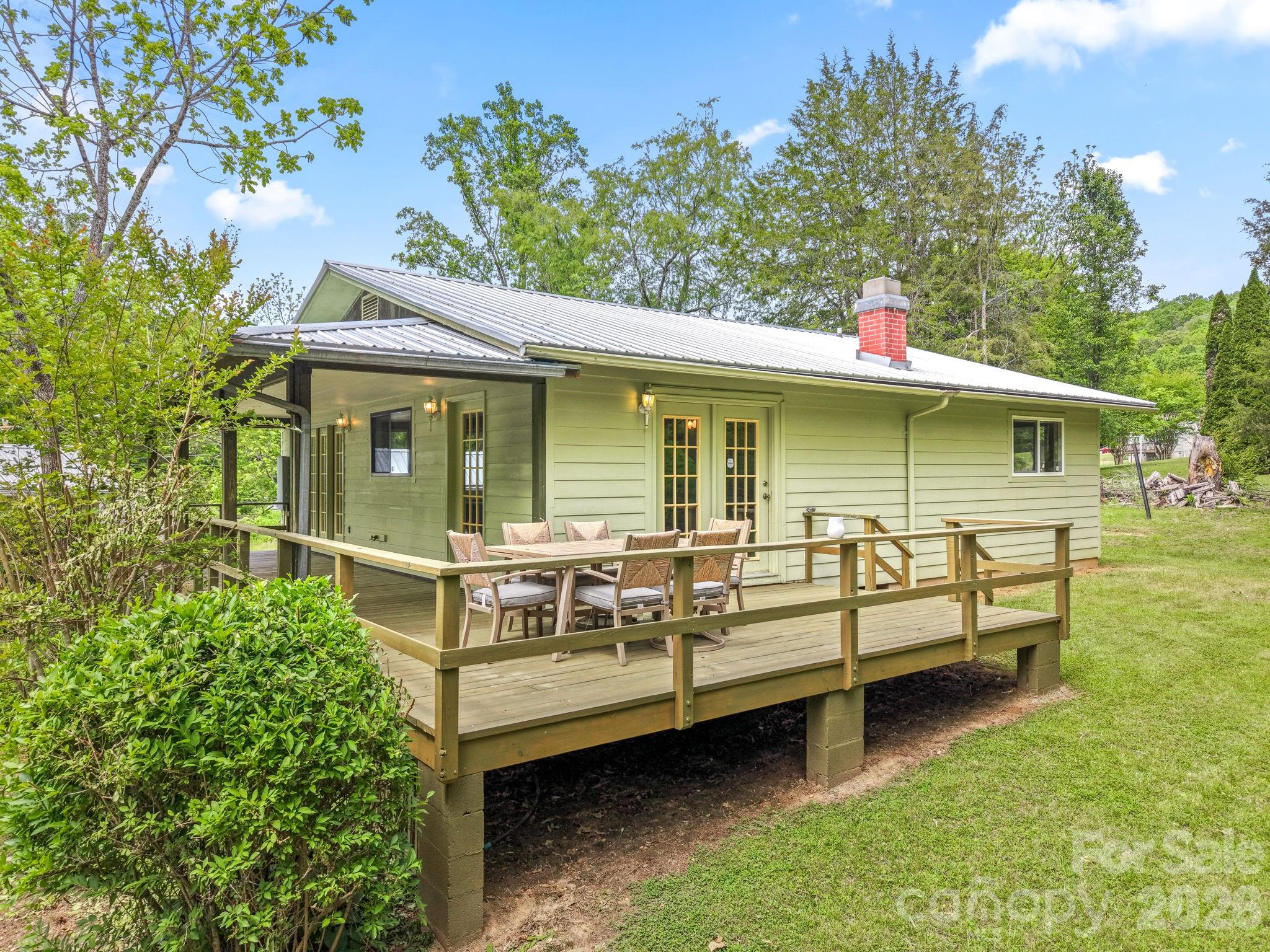 19 Quail Ridge Trail Franklin, NC 28734 - Photo 28 of 37 a view of a house with a yard