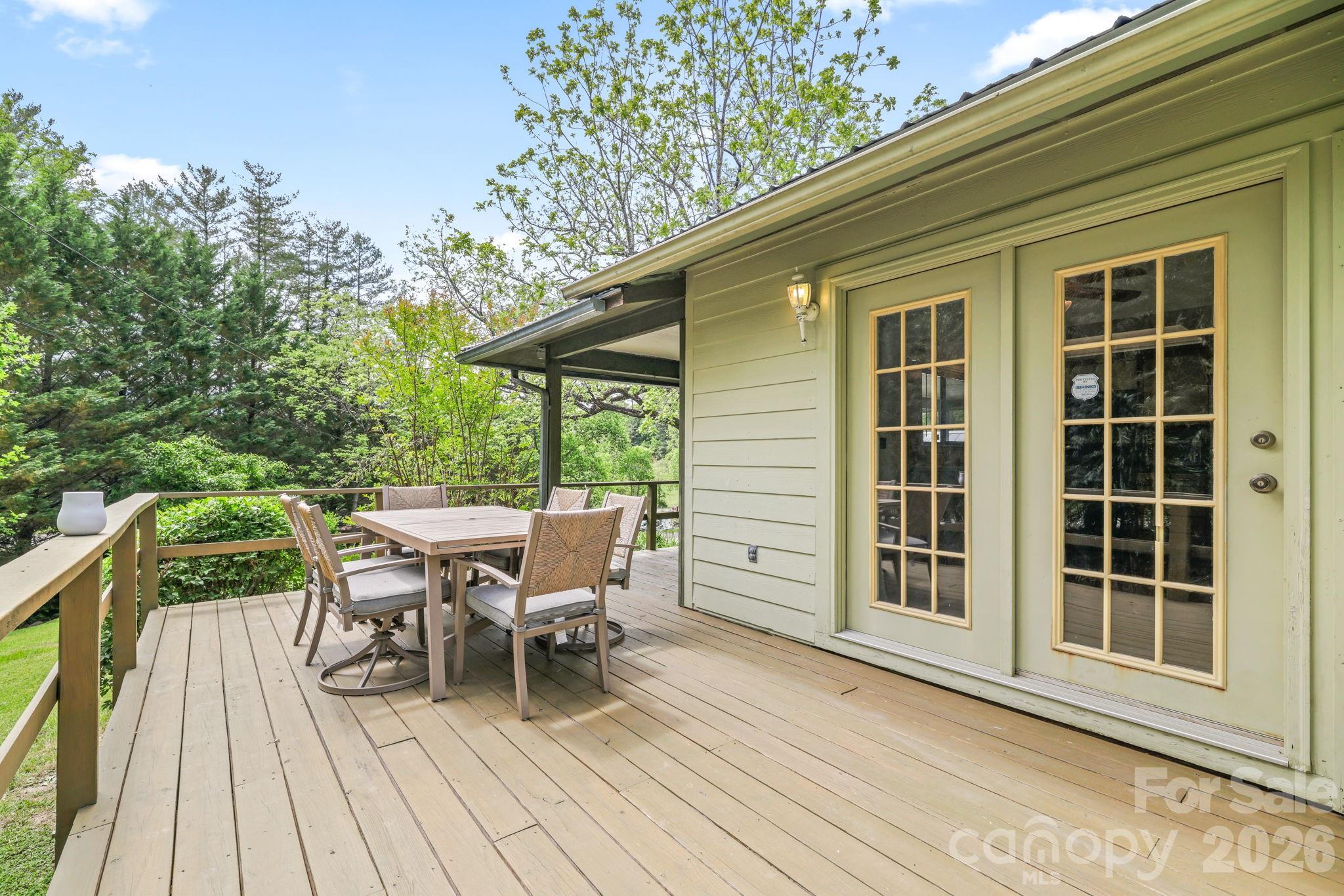 19 Quail Ridge Trail Franklin, NC 28734 - Photo 29 of 37 a view of a patio on the deck in front of house
