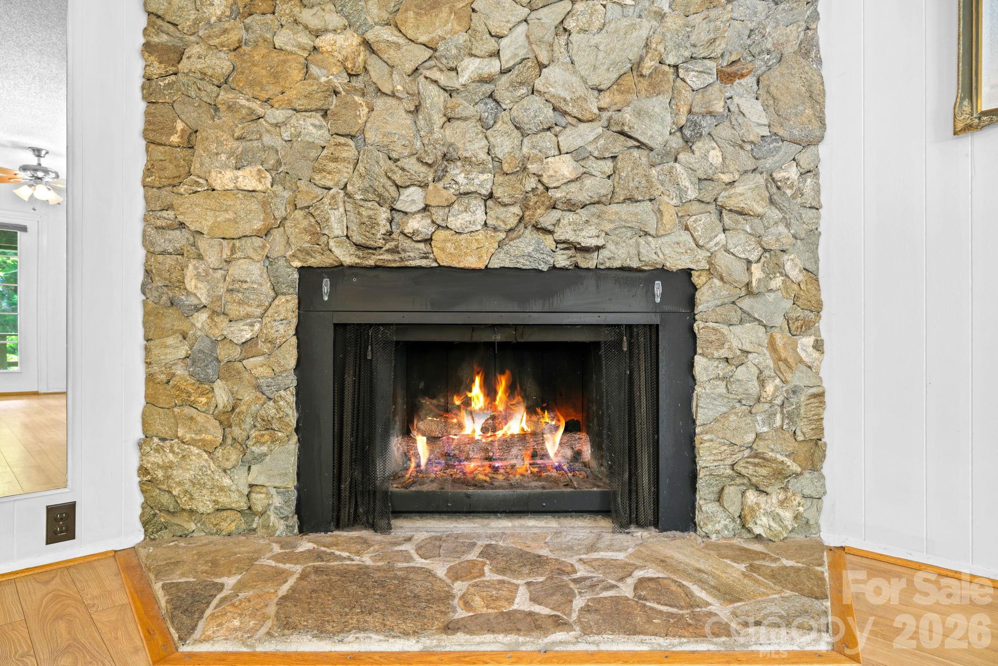 19 Quail Ridge Trail Franklin, NC 28734 - Photo 7 of 37 a view of empty room with a fireplace