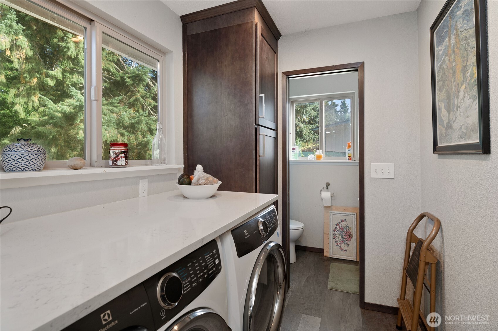 9101 112th Street Southwest Lakewood, WA 98498 - Photo 8 of 24 a room with a sink cabinets and a window