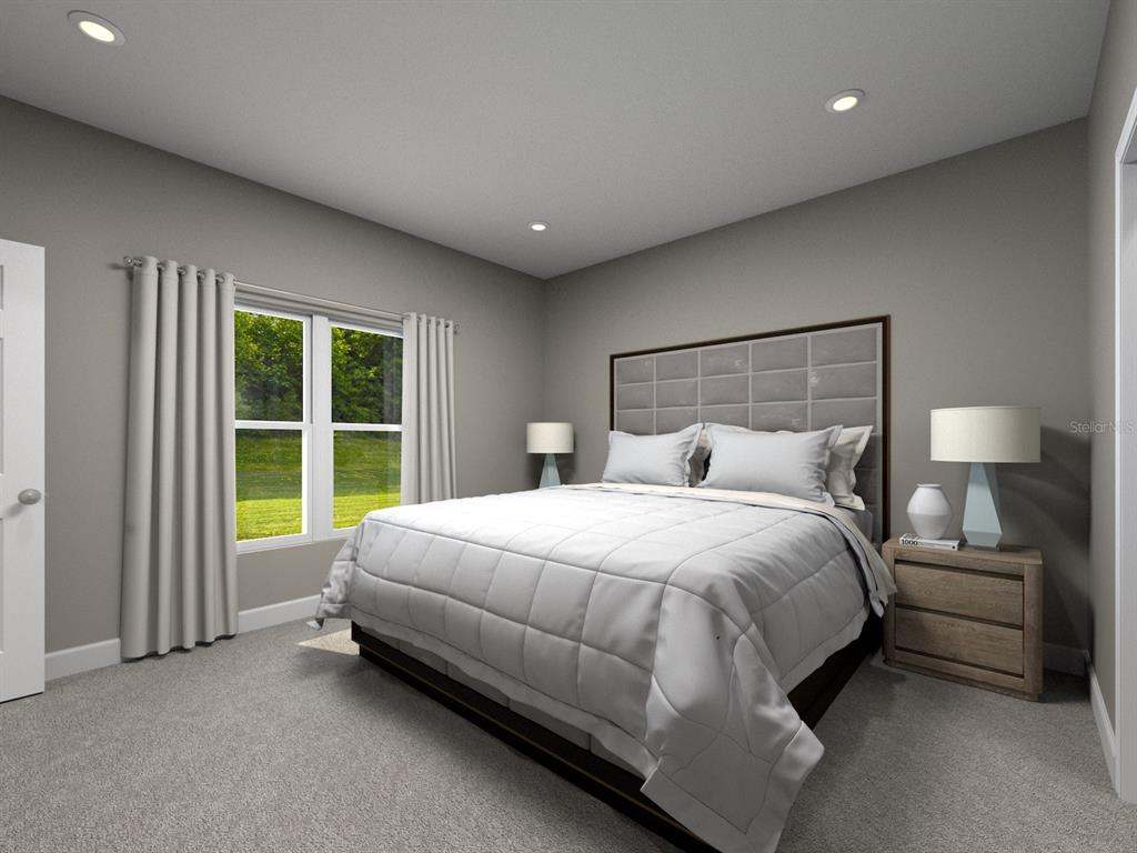 240 Church Street Lake Hamilton, FL 33844 - Photo 5 of 5 a bed room with a bed and a chair