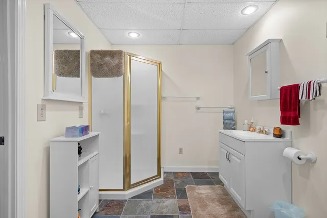 a bathroom with a sink toilet and vanity