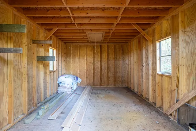 a front view of a house with a yard and pathway