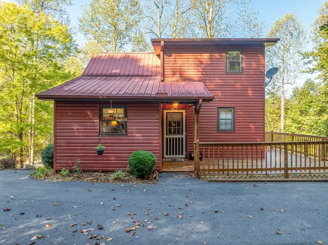 a view of balcony with chairs and wooden floor