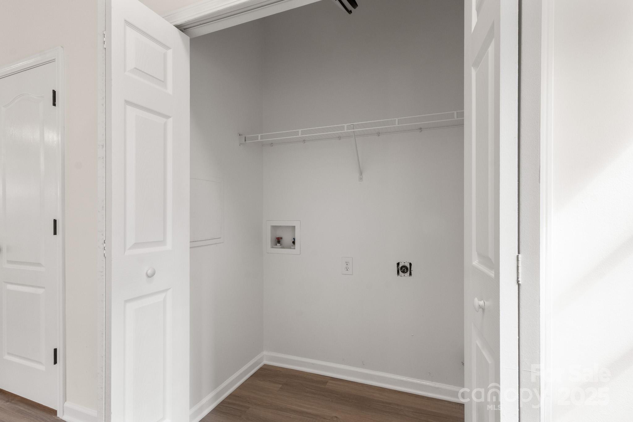 5529 Seths Drive Charlotte, NC 28269 - Photo 11 of 32 a view of small space with wooden floor