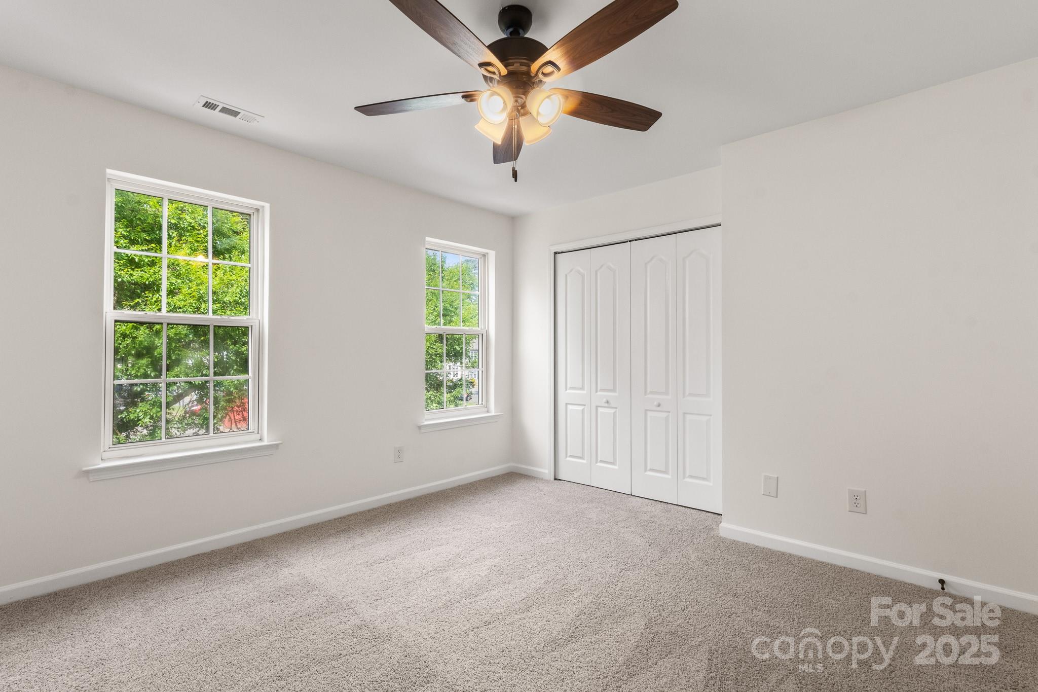5529 Seths Drive Charlotte, NC 28269 - Photo 20 of 32 a view of an empty room with a window