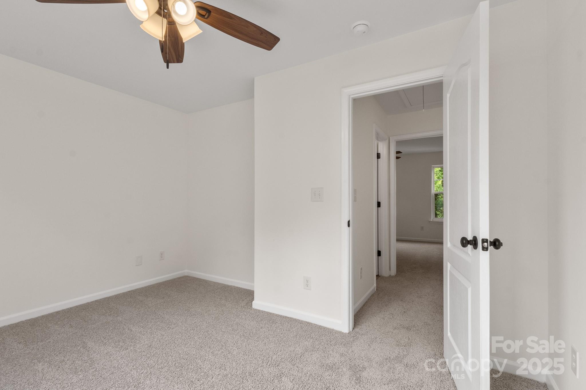 5529 Seths Drive Charlotte, NC 28269 - Photo 26 of 32 an empty room with a bathroom